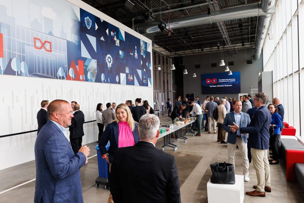 Attendees network during a Chicago corporate brand launch event.