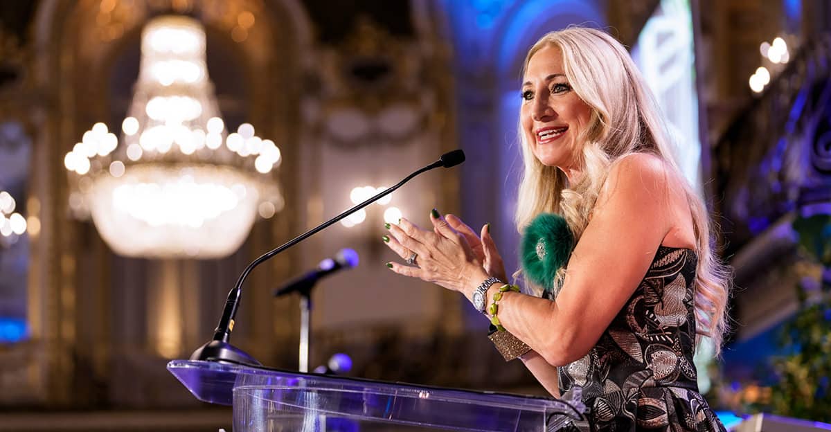 Chicago corporate event photography capturing a keynote speaker on stage during a gala program