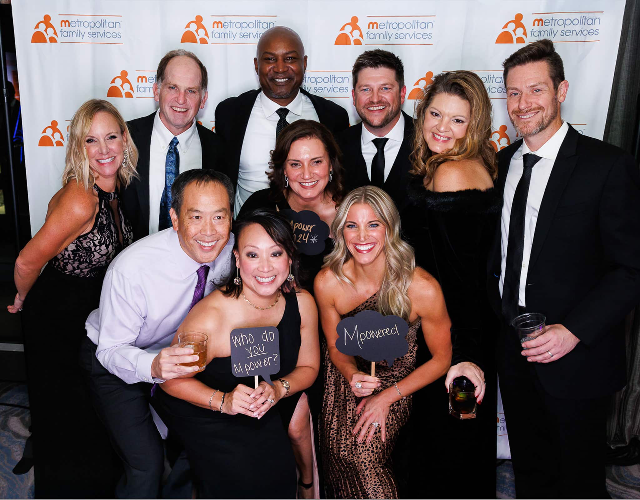 Chicago corporate event photographer covering gala step and repeat group photo.