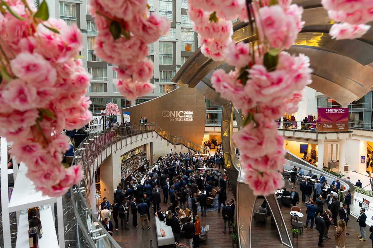 Overhead view of a packed reception area at a high-profile Chicago business event.