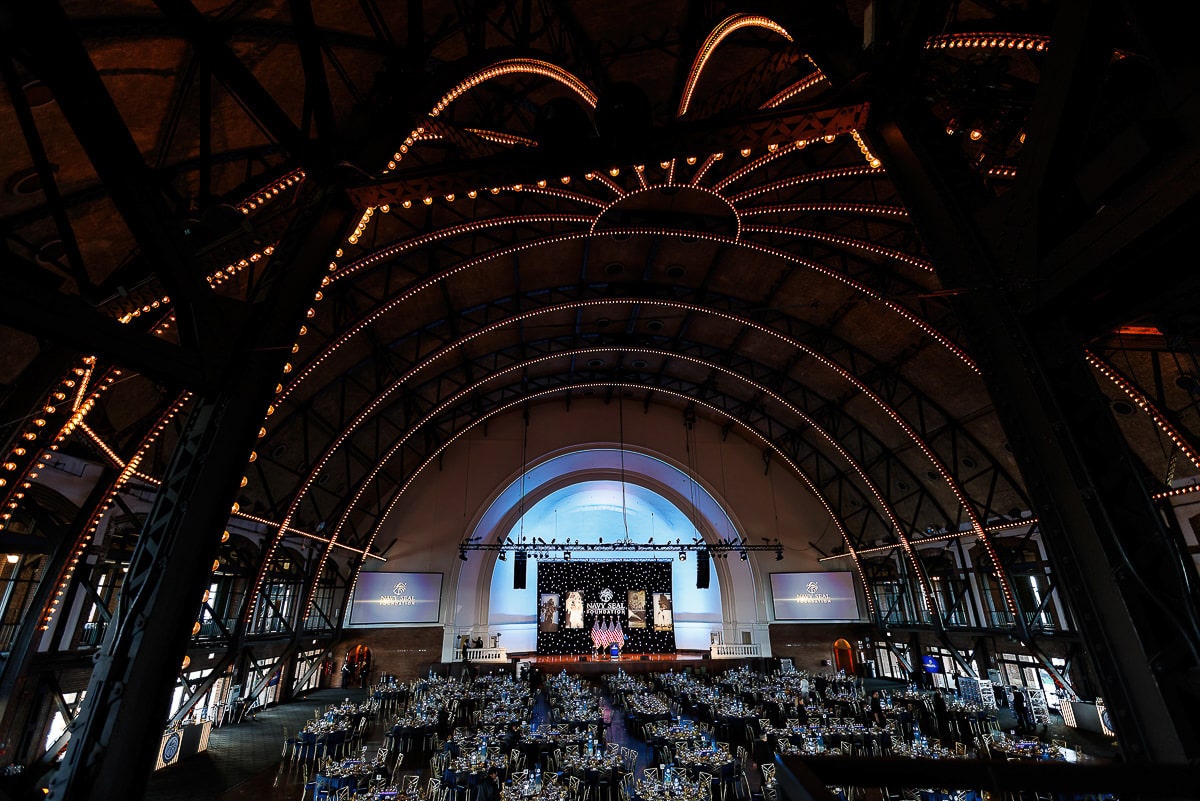 Wide shot of dramatic event lighting at a corporate venue in Chicago, captured by a Chicago Corporate Event Photographer